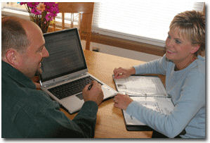 Wisconsin home inspection report is discussed with Milwaukee client.